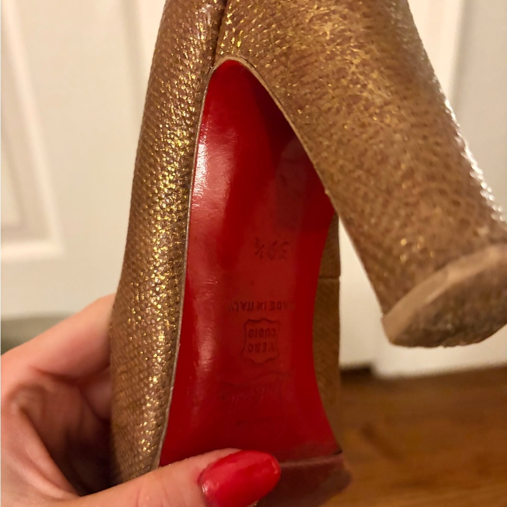 Louboutin Gold High Heel Pumps